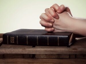 praying with a bible