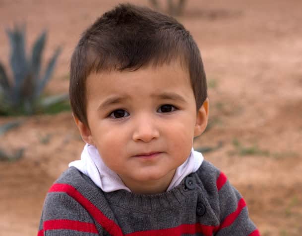 Cute boy thinking seriously