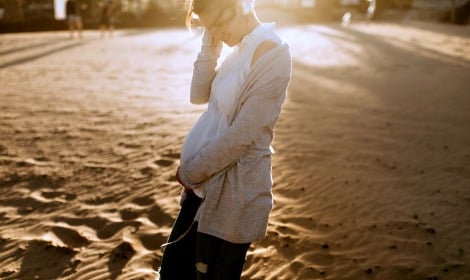 pregnant woman on a beach
