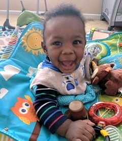 Daniel and Nabintu's son Noah playing