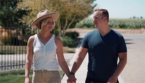 Hopeful adoptive parents Jeanna and Andy on a walk around their neighborhood