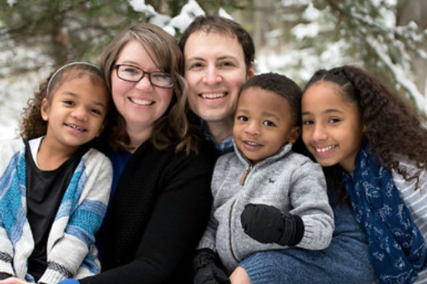 Christian adoptive couple Steve and Erin with their children