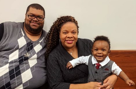 Christian adoptive couple Daniel and Nabintu with their son Noah